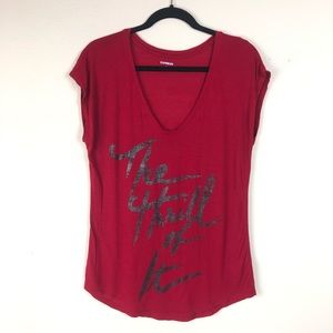 RED EXPRESS SHIRT “THE THRILL OF IT” TEXT IN A MED